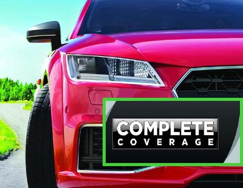 Bright pink SUV parked on sunny road with green grass, featuring headlight detail and "Complete Coverage" text overlay in black and green banner.