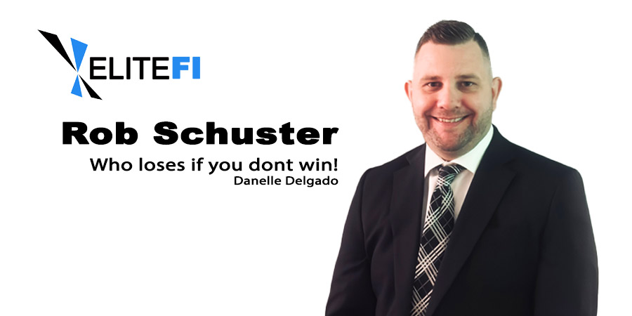 Professional man in dark blazer and plaid tie smiling at camera with Elite FI logo on white background.